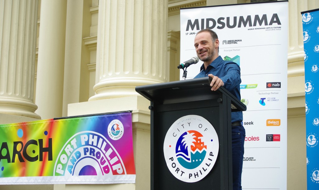 Anthony Wallace from Equal Love speaks at the raising of the rainbow flag in St Kilda this morning. (PHOTO: Matthew Wade; Star Observer)