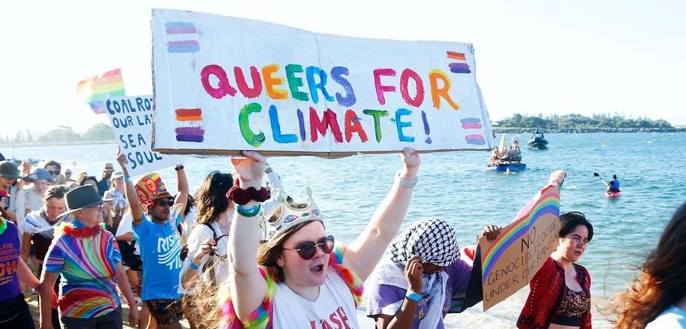 The LGBT Activists Marching Proudly At The Rising Tide Climate Protests